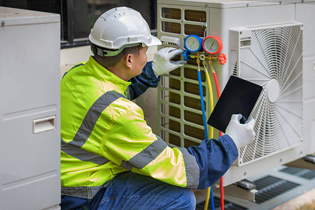 Professional Heat Pump Repair technician working in Lake Forest, CA